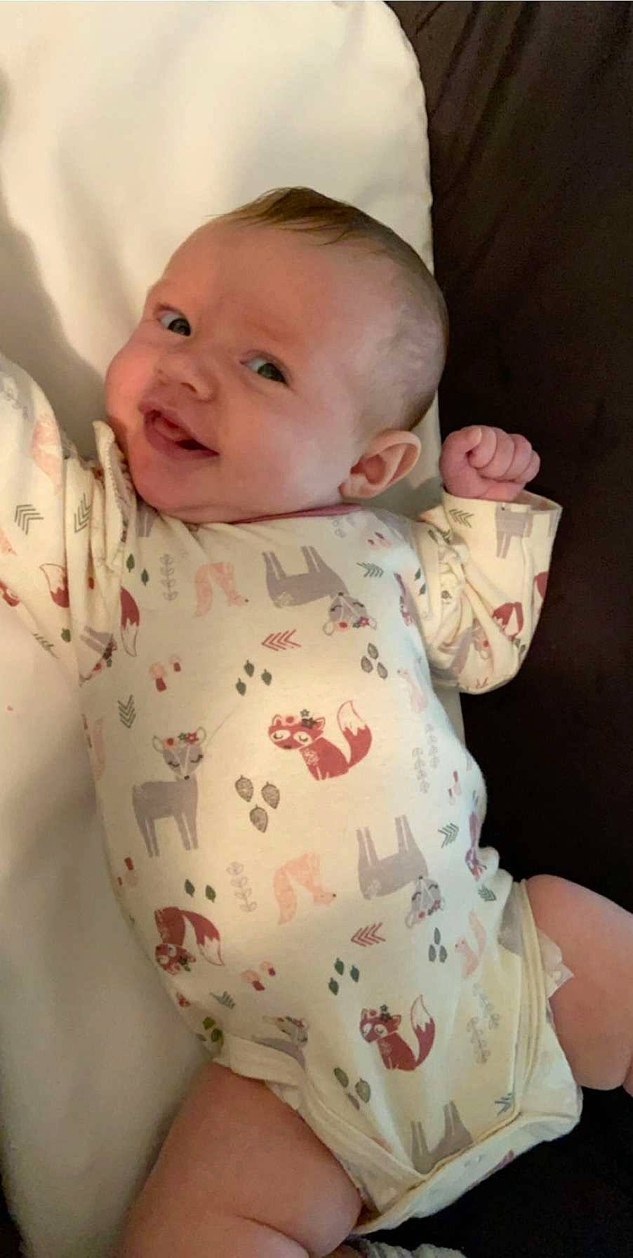 Mae joined the competition — help win amazing prizes! baby, baby_products, birth, cheek, child, face, facial_expression, head, lip, mouth, nose, person, product, skin, sleeve, smile, toddler