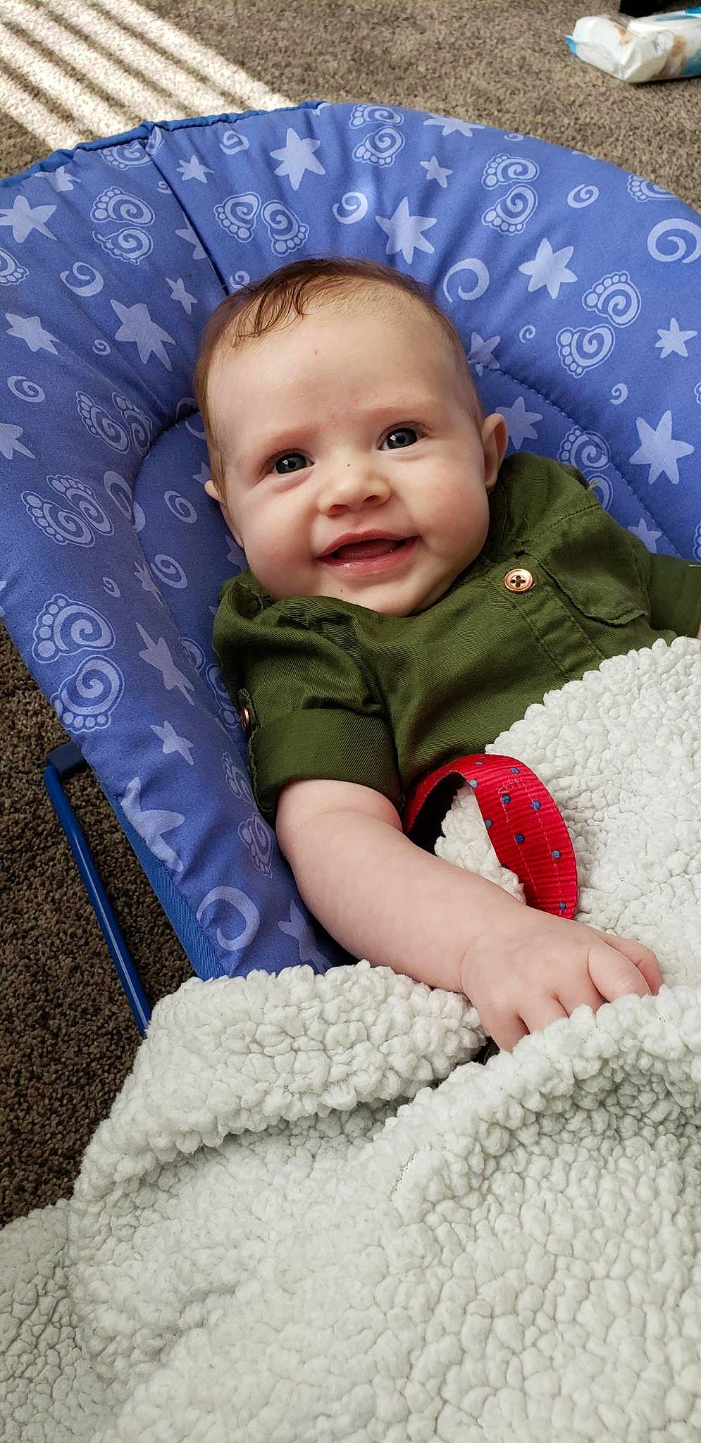 Mae is registered to the contest to win money with this photo: baby, baby_products, baby_sleeping, bedtime, blanket, cheek, child, comfort, eye, face, head, lip, mouth, nose, person, product, sitting, skin, smile, toddler