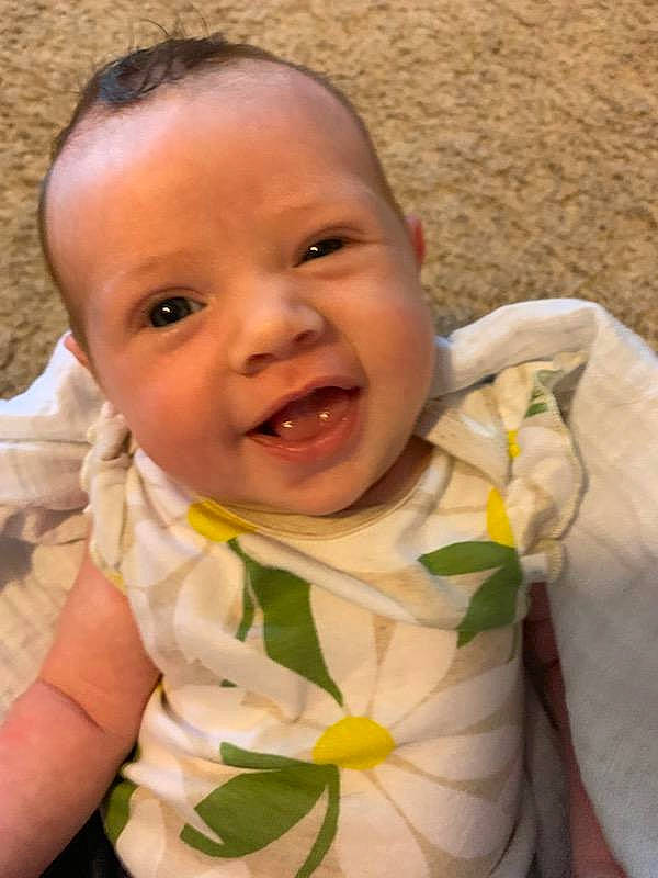 Mae is registered to the contest to win money with this photo: baby, cheek, child, chin, ear, eye, face, facial_expression, happy, iris, laugh, lip, mouth, nose, person, skin, smile, toddler