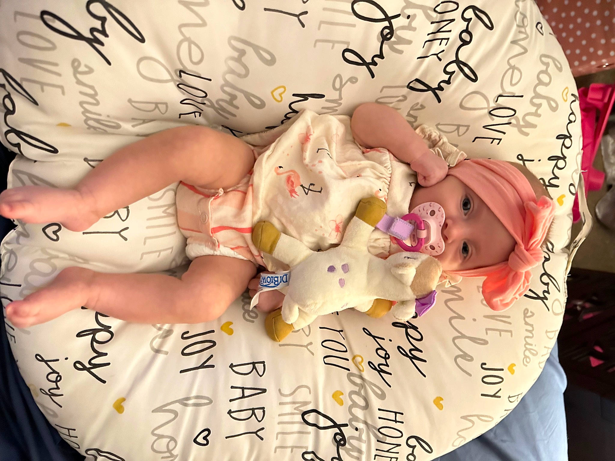 Aiyanna is registered to the contest to win money with this photo: child, event, facial_expression, flesh, font, handwriting, happy, headwear, pattern, person, sun_hat