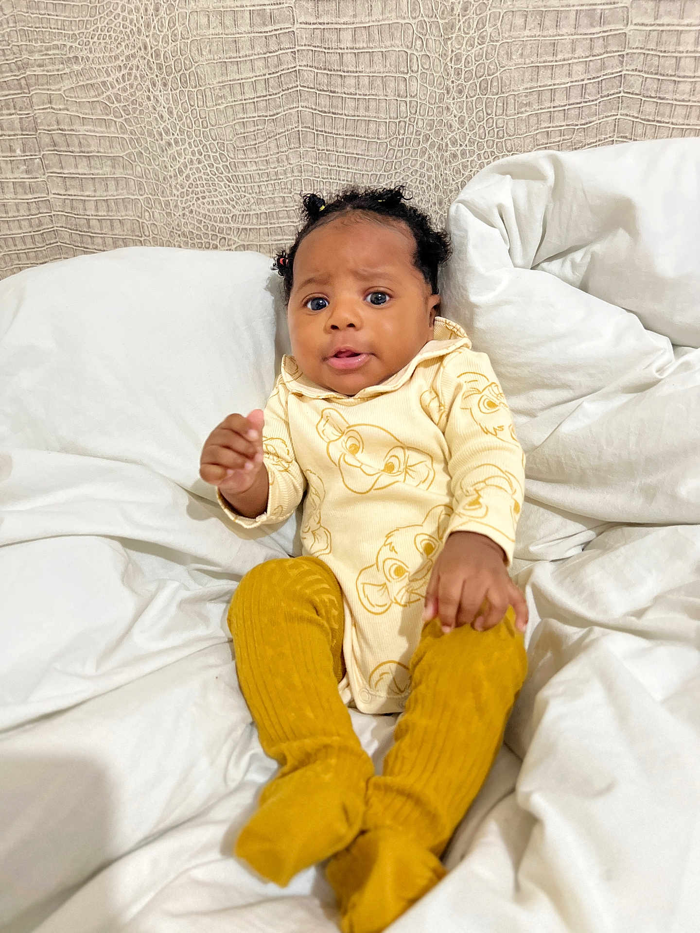 Catalina participe au concours pour gagner de l'argent avec cette photo : baby, bed, blanket, bodypart, clothing, couch, cushion, face, finger, furniture, hand, happy, head, homedecor, pants, person, photography, portrait, sitting, smile