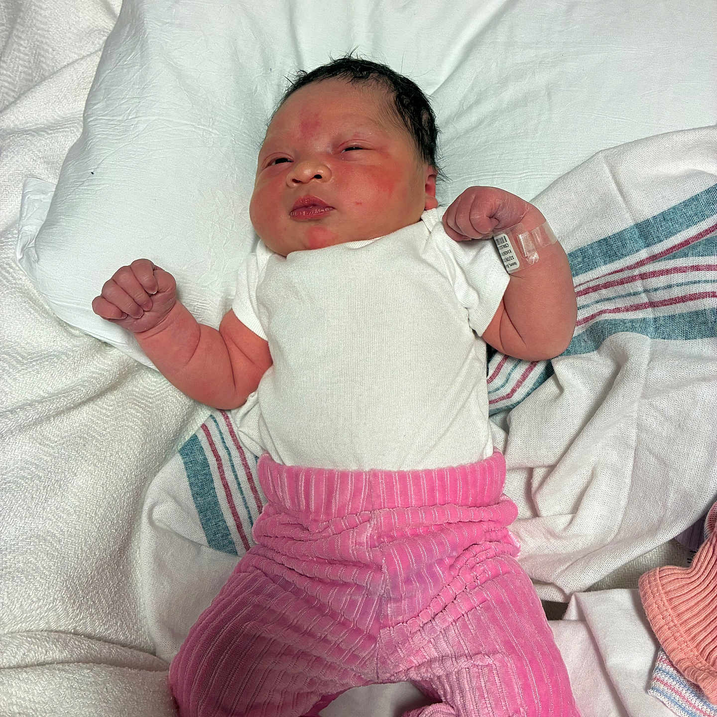 Nayali joined the competition — help win amazing prizes! baby, blanket, clothing, cute, face, hospital, hospital_wristband, indoors, infant, lying_down, newborn, person, pink_pants, portrait, resting, skin, sleepy, small_hands, soft_texture, white_shirt