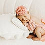 Jacklyn joined the competition — help win amazing prizes! baby, newborn, sleeping, pink, flower_headband, lace, pillow, white, soft_texture, infant, cute, peaceful, resting, indoors, portrait, skin, feet, hands, cozy, child
