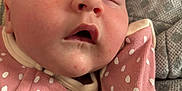 Jacklyn joined the competition — help win amazing prizes! baby, sleeping, infant, face, pink_clothing, polka_dot, blanket, closeup, cozy, rest, peaceful, soft_texture, child, mouth_open, head, skin, cute, indoors, portrait, newborn