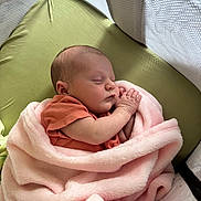 Jacklyn joined the competition — help win amazing prizes! baby, newborn, sleeping, blanket, pink_blanket, crib, mesh_sides, green_mattress, infant, peaceful, cozy, wrapped, cute, small, child, indoors, soft_texture, resting, person, toddler