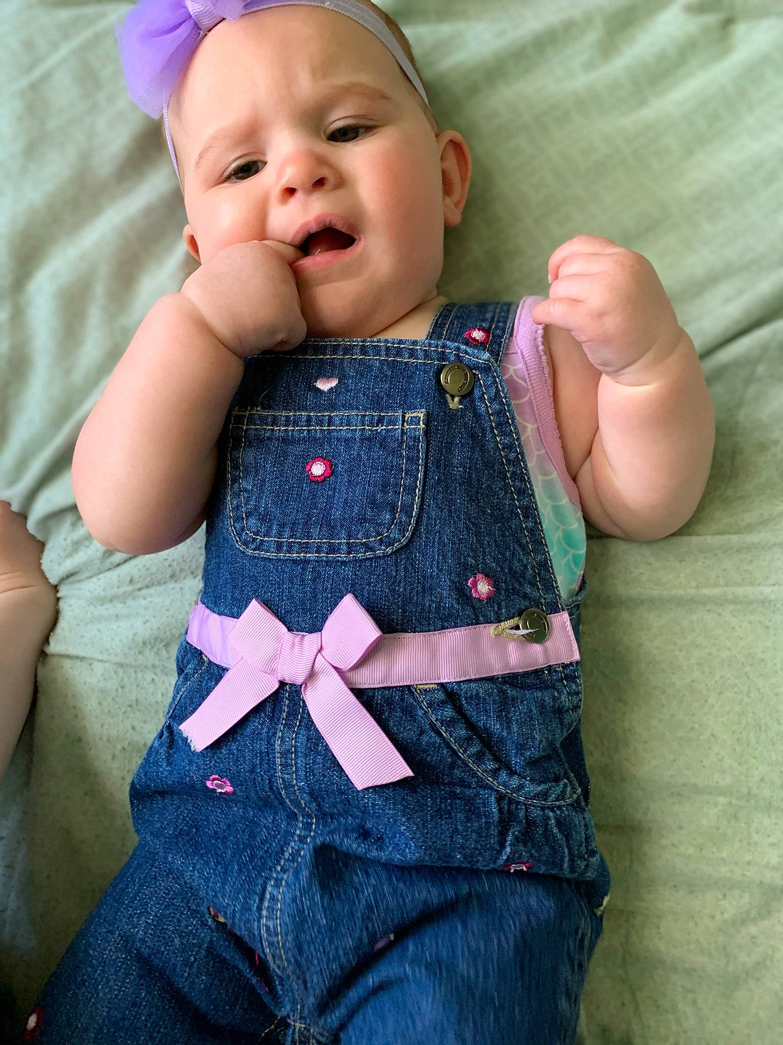 Kaitlyn is registered to the contest to win money with this photo: baby, baby_products, baby_toddler_clothing, cheek, child, clothing, denim, jeans, overall, pattern, person, pink, product, sitting, skin, textile, toddler