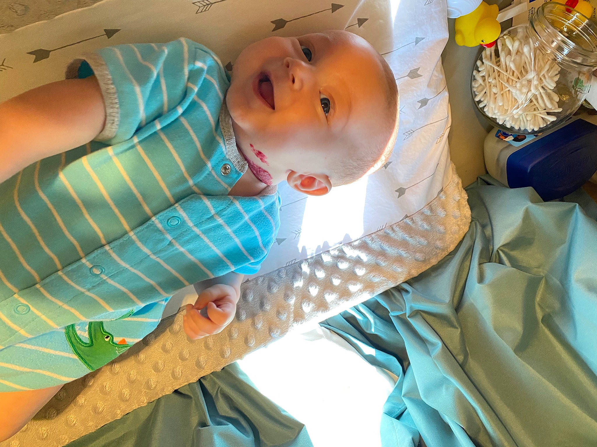 Liam is registered to the contest to win money with this photo: baby, baby_products, baby_toddler_clothing, child, comfort, event, hat, linens, pattern, person, plastic, room, sleeve, textile, toddler