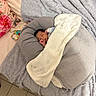 Noah participe au concours pour gagner de l'argent avec cette photo : baby, blanket, child, cozy, cushion, floor_tiles, floral_pillow, gray, heart_pattern, indoor, infant, newborn, peaceful, pillow, rest, sleeping, soft_texture, toy, white, wrapped