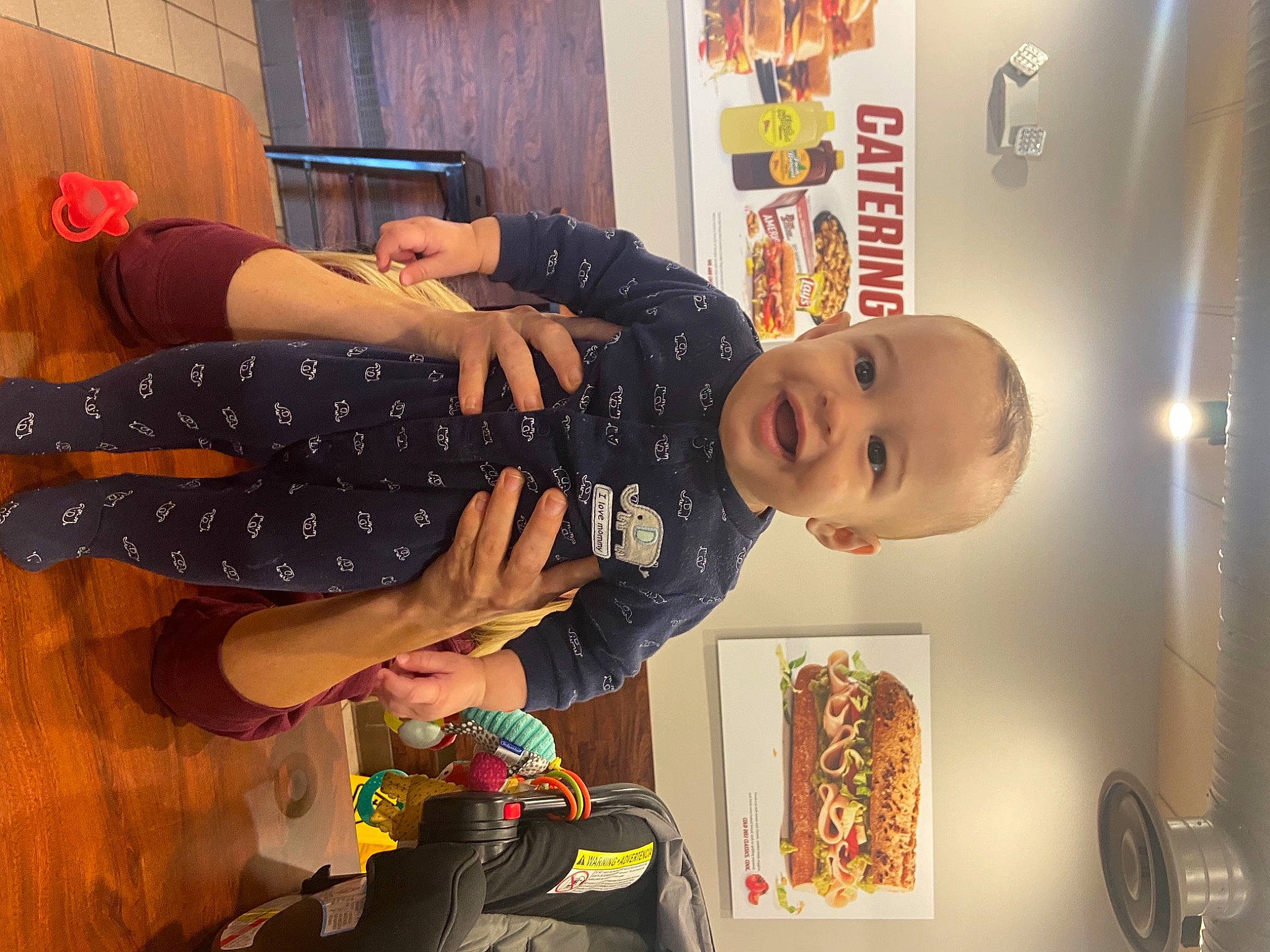 Adrien is registered to the contest to win money with this photo: baby, child, curtain, fashion_design, fun, happy, orange, pattern, person, room, textile, toddler, visual_arts, wrist, yellow