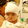 Ib Vang participe au concours pour gagner de l'argent avec cette photo : baby, towel, bathroom, child, person, face, adult, holding, white, wrapped, headwear, sink, mirror, shelf, container, toothbrush, faucet, wood, curious, indoor
