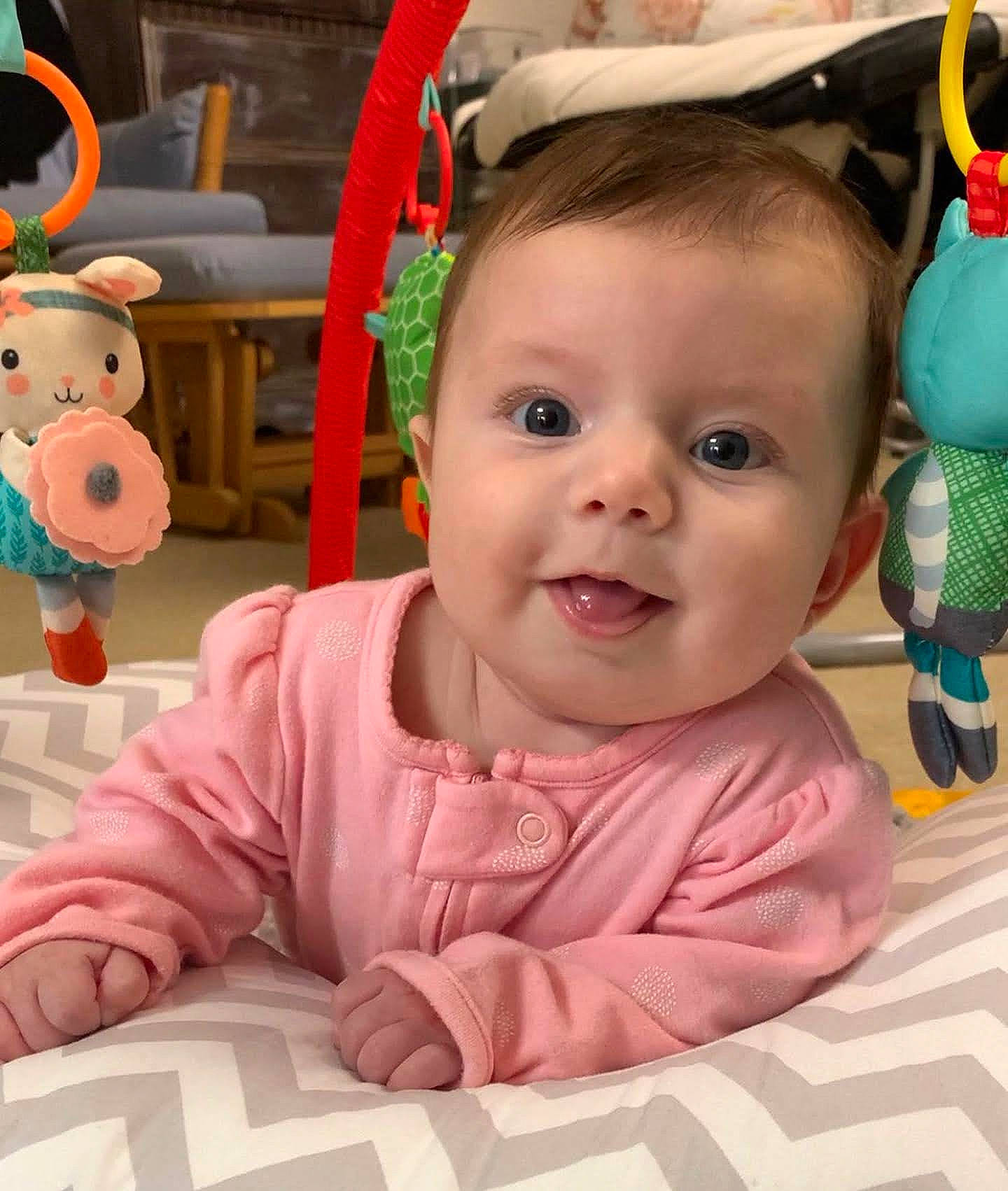 Iris joined the competition — help win amazing prizes! baby, baby_toddler_clothing, cheek, ear, facial_expression, fun, happy, head, iris, mammal, nose, organ, person, pink, product, skin, smile, textile, toddler, toy