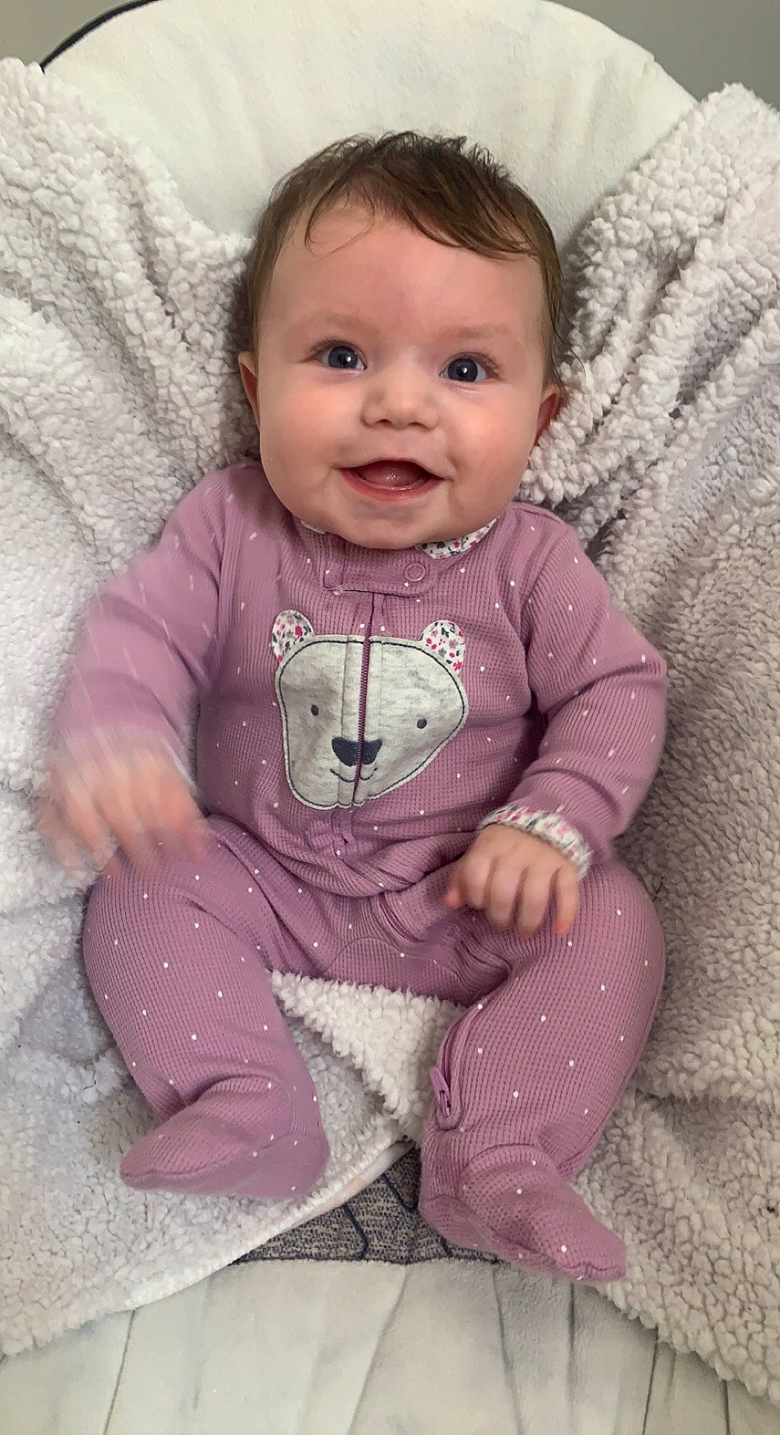 Iris is registered to the contest to win money with this photo: baby_toddler_clothing, cheek, chin, clothing, comfort, eye, eyebrow, face, facial_expression, iris, joy, lip, nose, organ, outerwear, person, pink, purple, skin, sleeve