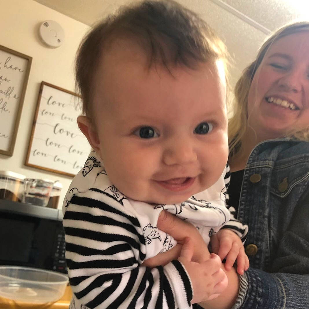 Iris is registered to the contest to win money with this photo: baby_toddler_clothing, cheek, child, chin, cool, drinkware, eye, face, fun, gesture, happy, head, iris, joy, nose, organ, person, skin, smile, tableware