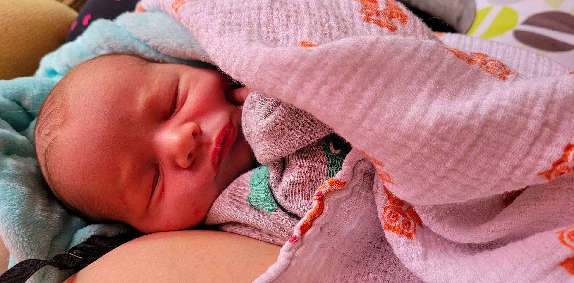 Layton is registered to the contest to win money with this photo: baby, baby_sleeping, baby_toddler_clothing, bedtime, cheek, child, chin, close_up, comfort, face, head, linens, lip, nose, person, pink, red, skin, textile, toddler