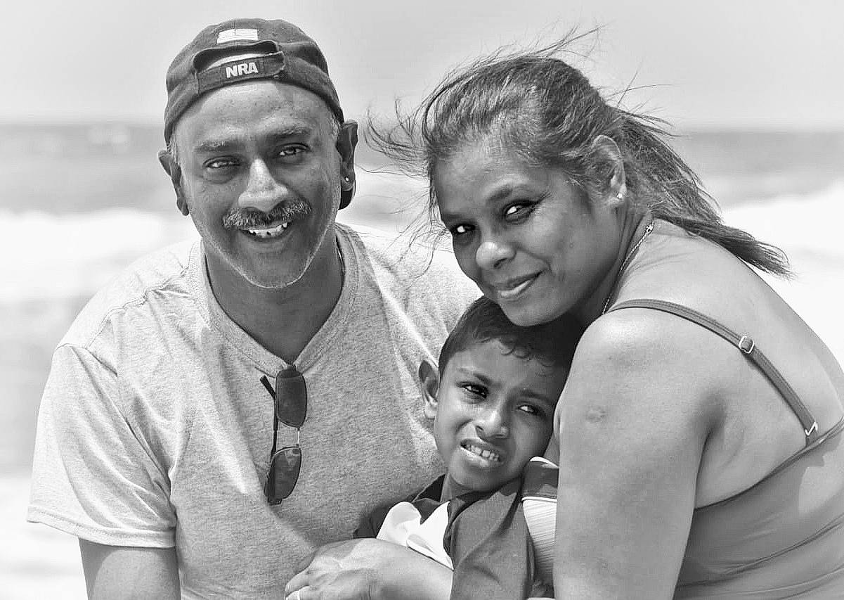 Tonka is registered to the contest to win money with this photo: black, black_and_white, child, daughter, facial_expression, family, father, fun, happy, headwear, joy, male, monochrome, monochrome_photography, mother, people, person, photograph, photography, smile