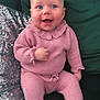 Bambi joined the competition — help win amazing prizes! baby, infant, smiling, pink_clothing, knitted_outfit, blue_eyes, couch, pillow, sequin, happy, cute, indoor, portrait, child, sitting, cozy, furniture, home, soft, casual