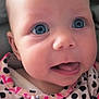 Bambi is registered to the contest to win money with this photo: baby, infant, closeup, face, blue_eyes, skin, expression, clothing, polka_dot, pink, cute, child, young, portrait, human, apparel, soft_lighting, small_hands, indoors, adorable