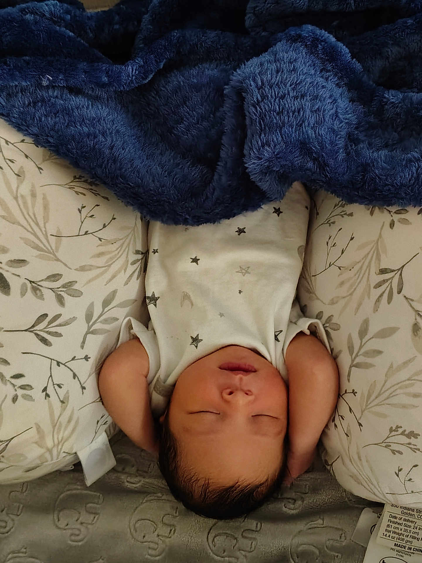 Kairo is registered to the contest to win money with this photo: baby, sleeping, blanket, pillow, infant, bed, rest, peaceful, cozy, comfort, face, head, arms, clothing, pattern, soft, cute, newborn, indoor, relaxation