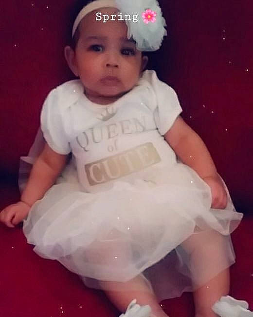 Theia is registered to the contest to win money with this photo: baby, baby_toddler_clothing, ballet_tutu, cheek, child, clothing, costume, dress, fun, hair_accessory, happy, headgear, headwear, person, pink, product, skin, smile, toddler, white