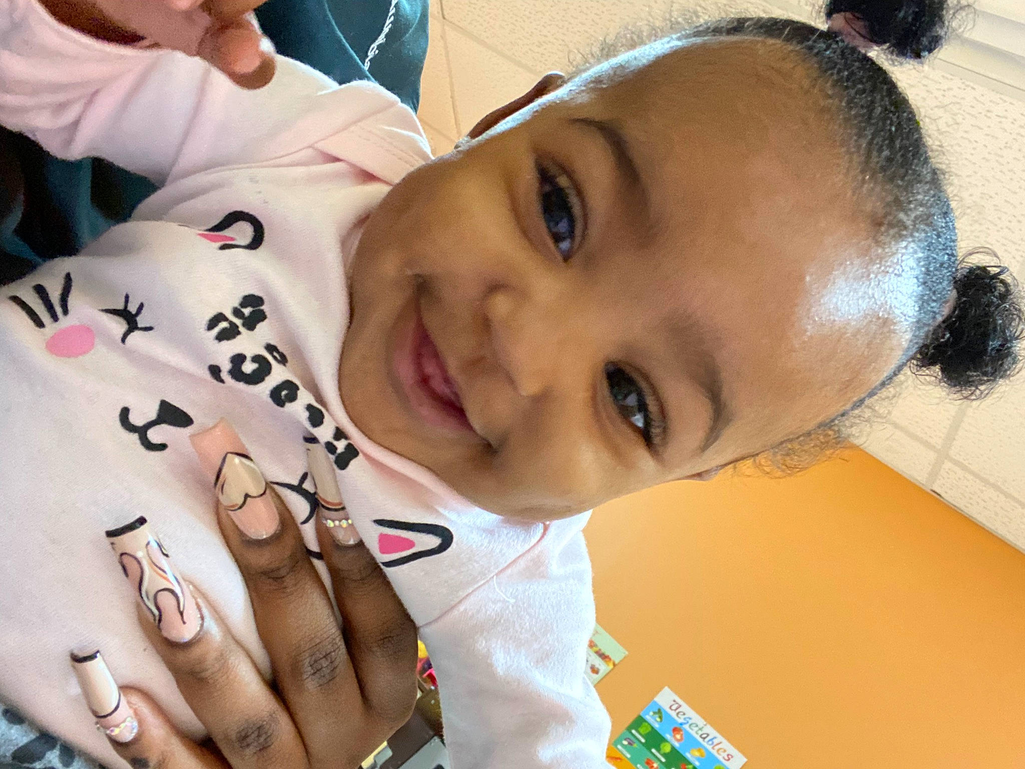 Malaysia is registered to the contest to win money with this photo: beauty, cheek, child, chin, cool, ear, eyebrow, eyelash, finger, forehead, gesture, happy, iris, lip, mouth, neck, nose, person, skin, smile