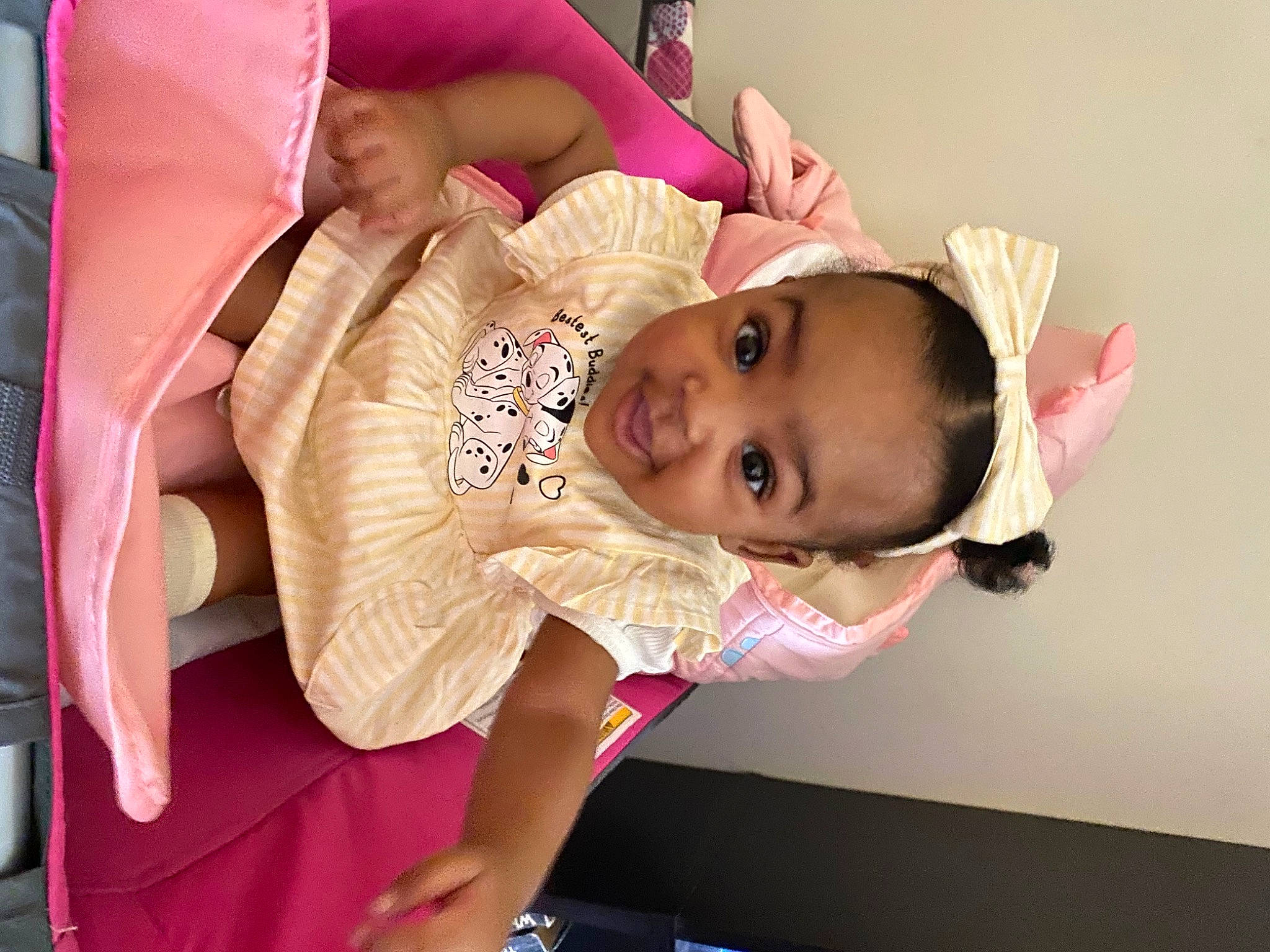 Malaysia is registered to the contest to win money with this photo: baby, baby_products, baby_toddler_clothing, cheek, child, comfort, dress, event, eyelash, fashion_accessory, fun, hair_accessory, happy, hat, magenta, person, pink, room, skin, smile