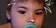 Loki is registered to the contest to win money with this photo: child, toddler, pacifier, face, digital_art, cat_ears, nose_doodle, skin, hair, portrait, indoors, expressionless, cute, baby, head, young_child, sitting, closeup, filter, drawing