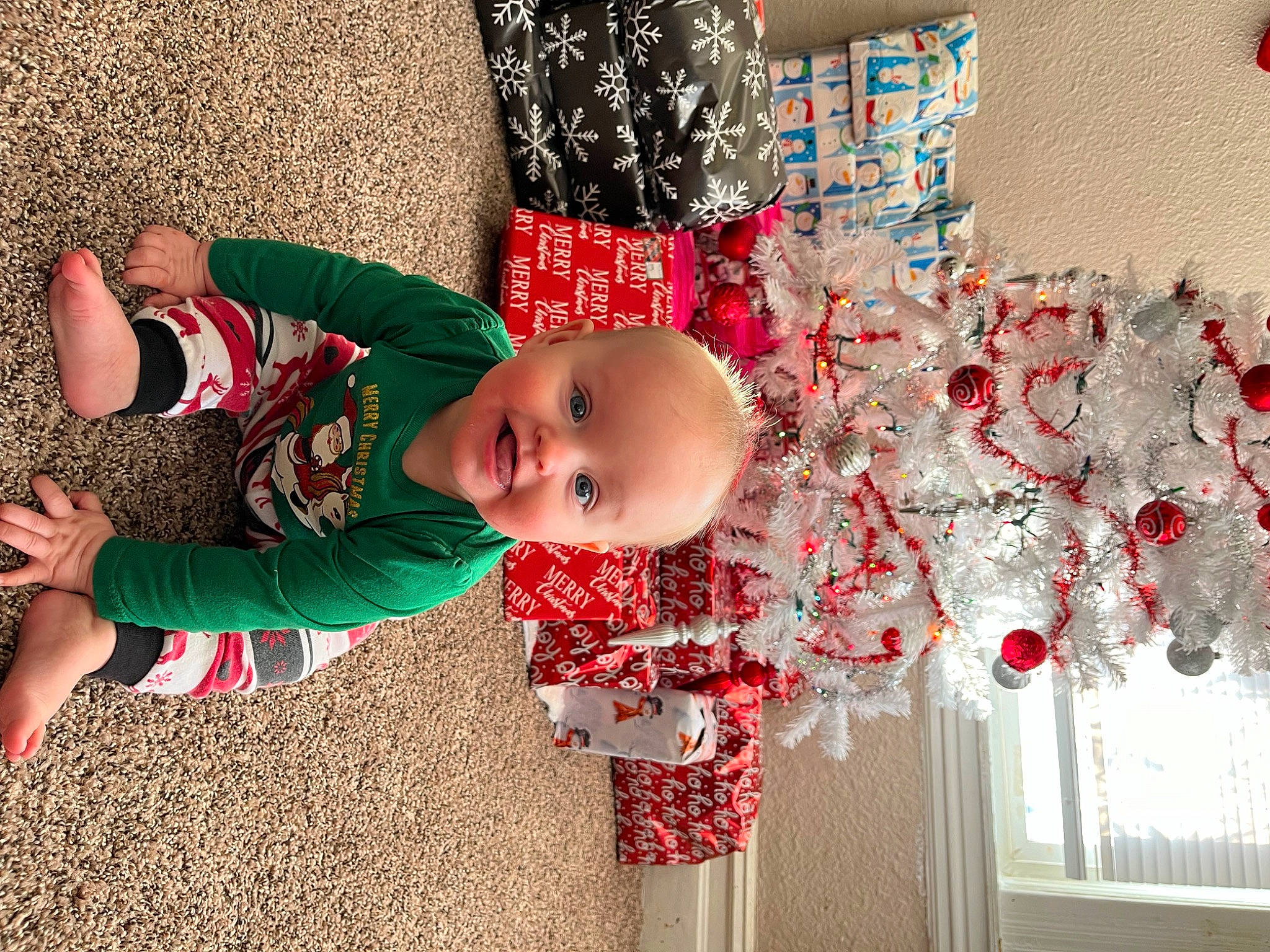 Kinzley is registered to the contest to win money with this photo: baby, baby_toddler_clothing, child, christmas, christmas_decoration, christmas_eve, christmas_ornament, event, fun, happy, holiday, joy, leaf, pattern, person, pink, plant, product, red, smile