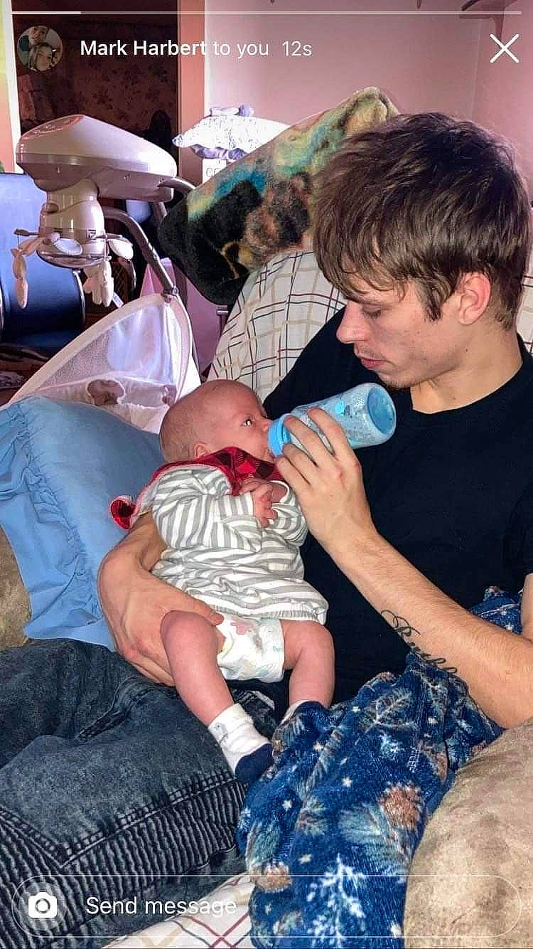 Jayden Harbert joined the competition — help win amazing prizes! baby, black, child, comfort, event, fun, interaction, joint, lap, leg, leisure, mouth, muscle, organ, people, person, shoulder, sitting, t_shirt, thigh