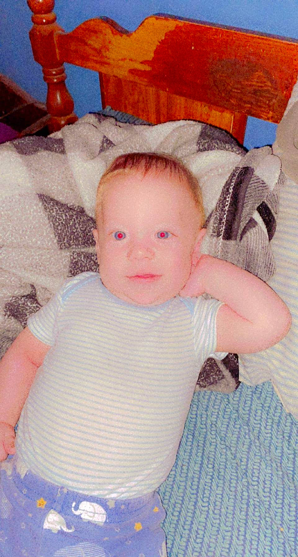 Jayden Harbert is registered to the contest to win money with this photo: baby, baby_toddler_clothing, cheek, child, comfort, eye, face, flowerpot, head, human_body, iris, linens, lip, person, pink, skin, sleeve, smile, t_shirt, textile