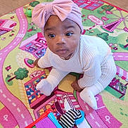 Bryanna participe au concours pour gagner de l'argent avec cette photo : baby, child, childrens_toy, colorful_rug, curious, cute, floor, headband, indoor, infant, pink_bow, playtime, plush_chair, room, sitting, soft_toy, striped_sock, toy_cube, white_outfit, wooden_floor