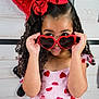 Kamilah is registered to the contest to win money with this photo: accessories, bag, balloon, child, clothing, dress, face, female, flower, formalwear, girl, glasses, handbag, head, person, petal, photography, plant, portrait, sunglasses