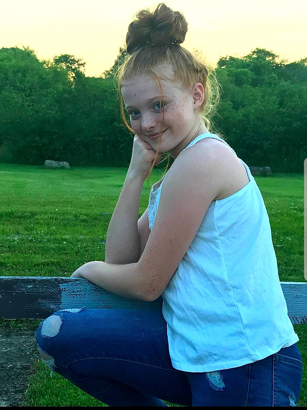 Gracey is registered to the contest to win money with this photo: blond, grass, green, joy, lady, leisure, long_hair, people_in_nature, person, photography, shoulder, sitting, summer, sunlight