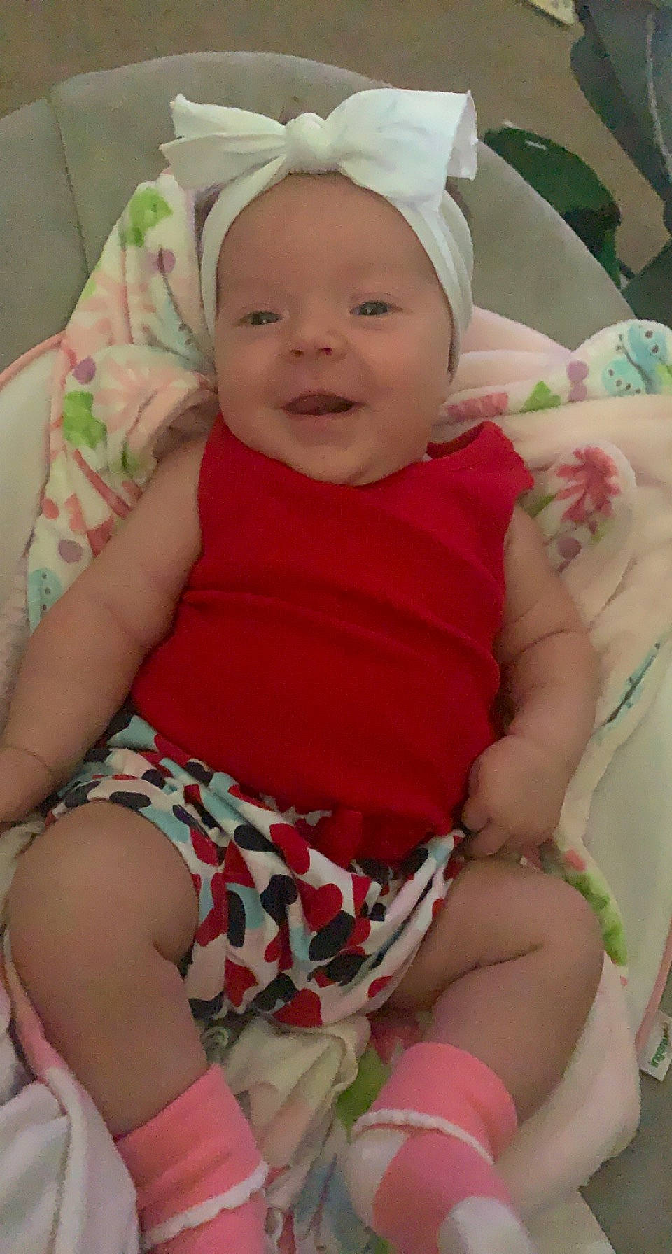 Harper Lynn joined the competition — help win amazing prizes! baby, baby_toddler_clothing, cheek, child, comfort, facial_expression, finger, happy, headwear, human_leg, iris, leg, mouth, pattern, person, pink, skin, sleeve, smile, thigh