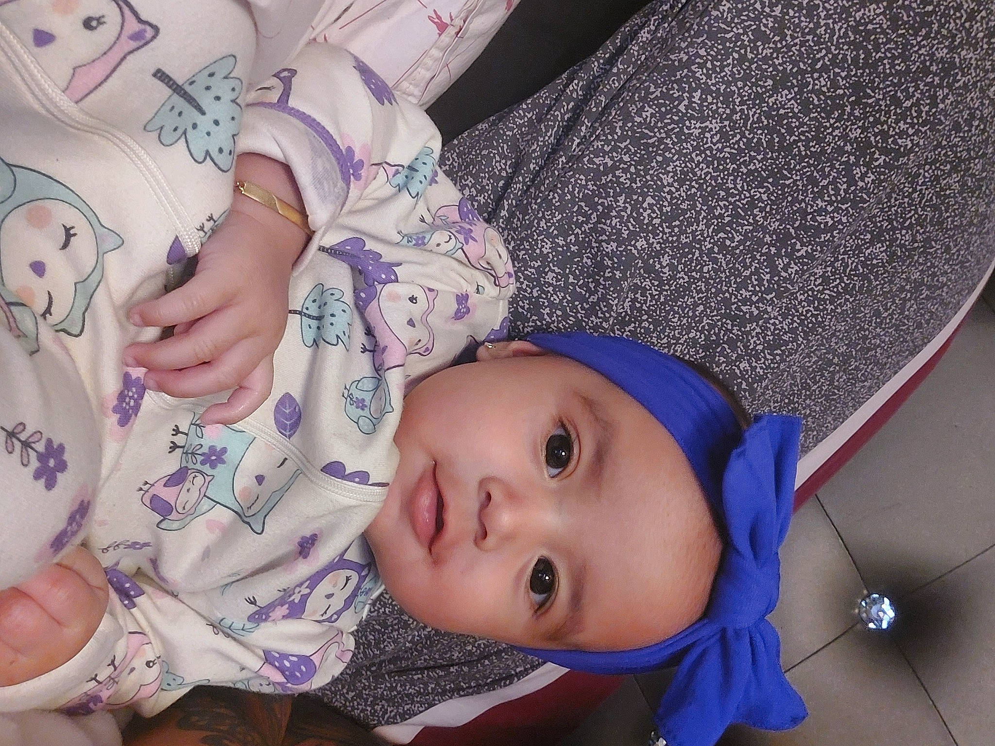 Azul is registered to the contest to win money with this photo: baby, baby_toddler_clothing, cheek, child, electric_blue, eyelash, finger, hand, hat, headgear, headwear, iris, lip, mouth, nose, person, product, purple, skin, toddler