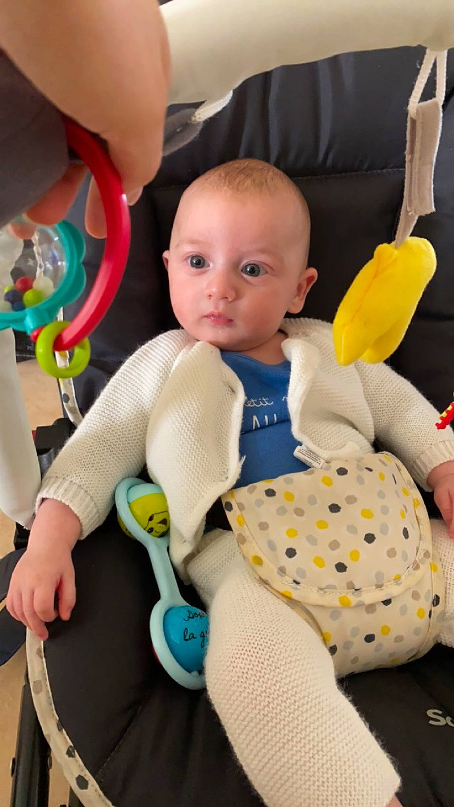 Aaron participe au concours pour gagner de l'argent avec cette photo : baby, baby_products, baby_safety, baby_toddler_clothing, baby_toys, child, comfort, finger, fun, person, play, product, room, sitting, skin, stuffed_toy, textile, thumb, toddler, toy