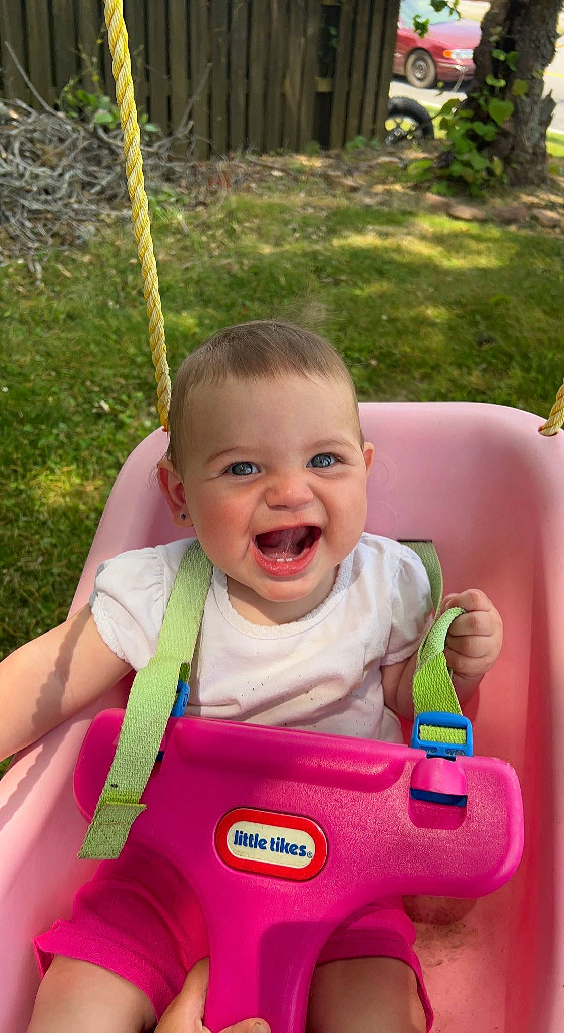 Enola joined the competition — help win amazing prizes! baby, baby_playing_with_toys, baby_toddler_clothing, cheek, face, facial_expression, finger, fun, grass, green, happy, head, leisure, organ, person, photograph, pink, red, skin, smile