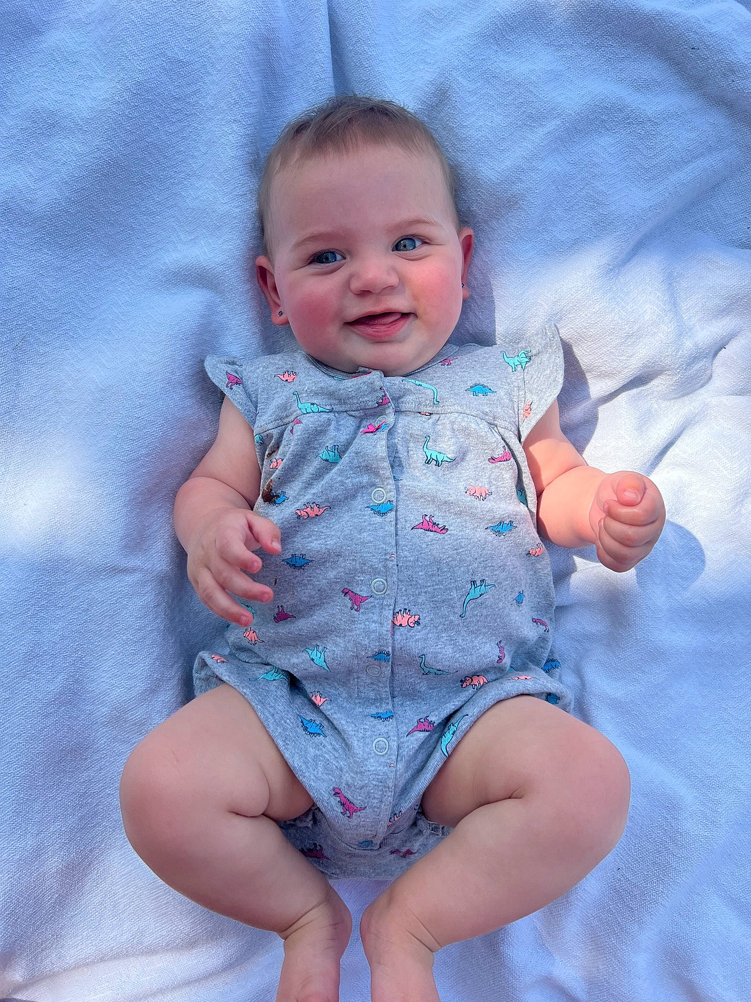 Enola joined the competition — help win amazing prizes! azure, baby, baby_toddler_clothing, barefoot, cheek, dress, eye, finger, happy, human_body, iris, joy, leg, pattern, person, pink, skin, sleeve, smile, textile