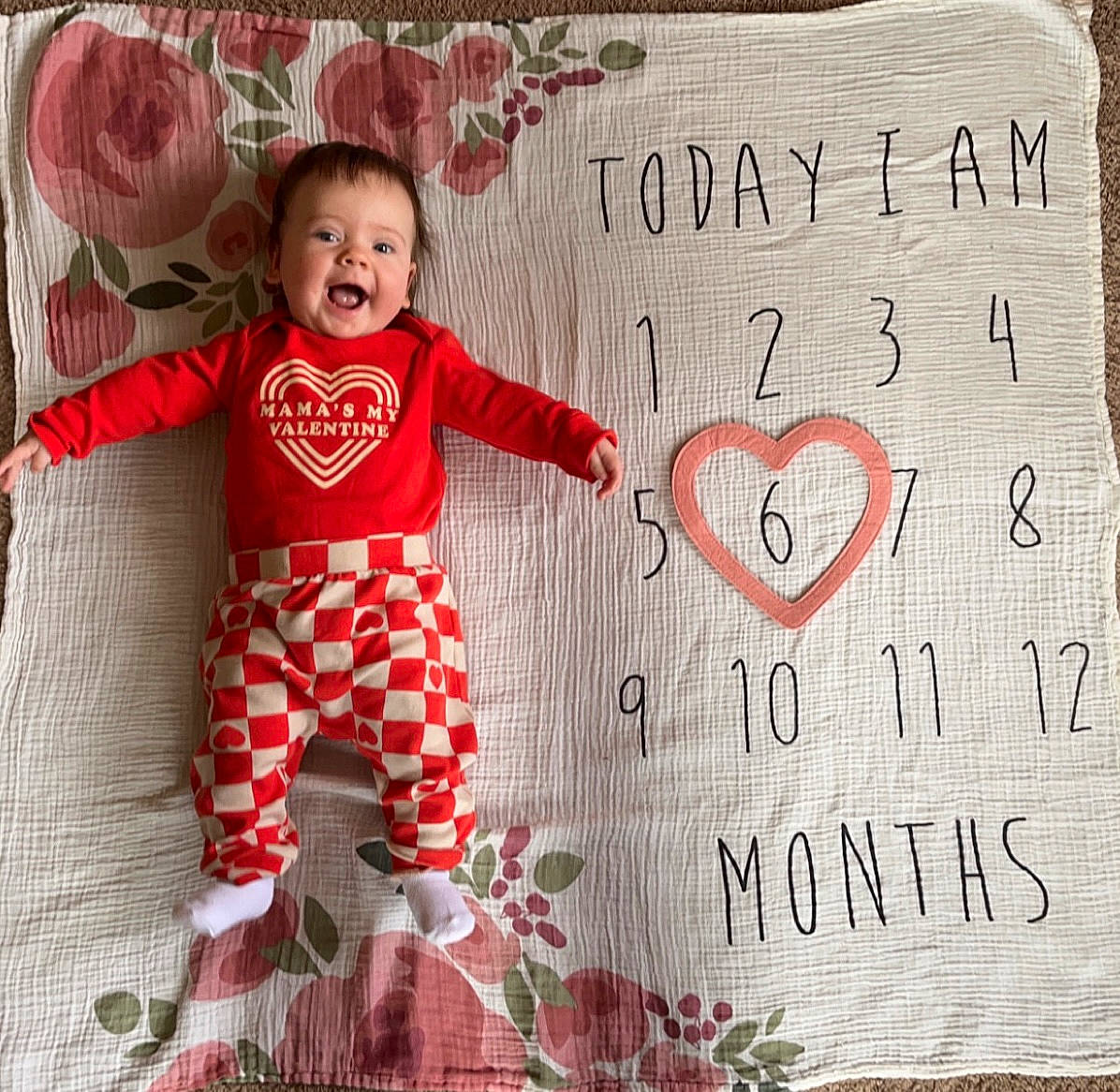 Emma joined the competition — help win amazing prizes! baby_toddler_clothing, beauty, child, design, facial_expression, font, handwriting, happy, leaf, linens, pattern, person, pink, product, rectangle, red, sleeve, smile, t_shirt, textile