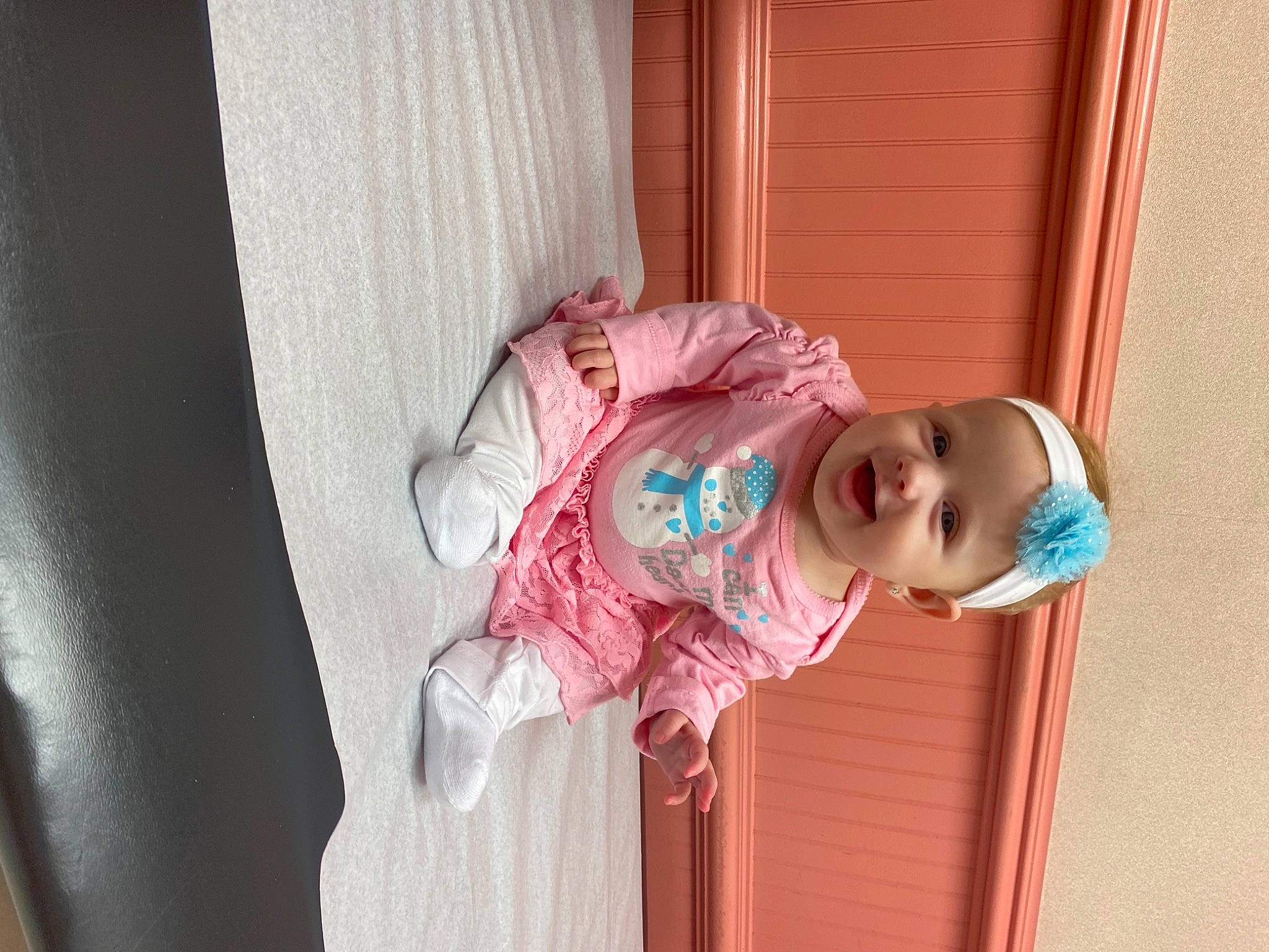 Kenzley joined the competition — help win amazing prizes! baby, baby_products, baby_toddler_clothing, curtain, door, headwear, peach, person, pink, teal, textile, toddler, window_treatment