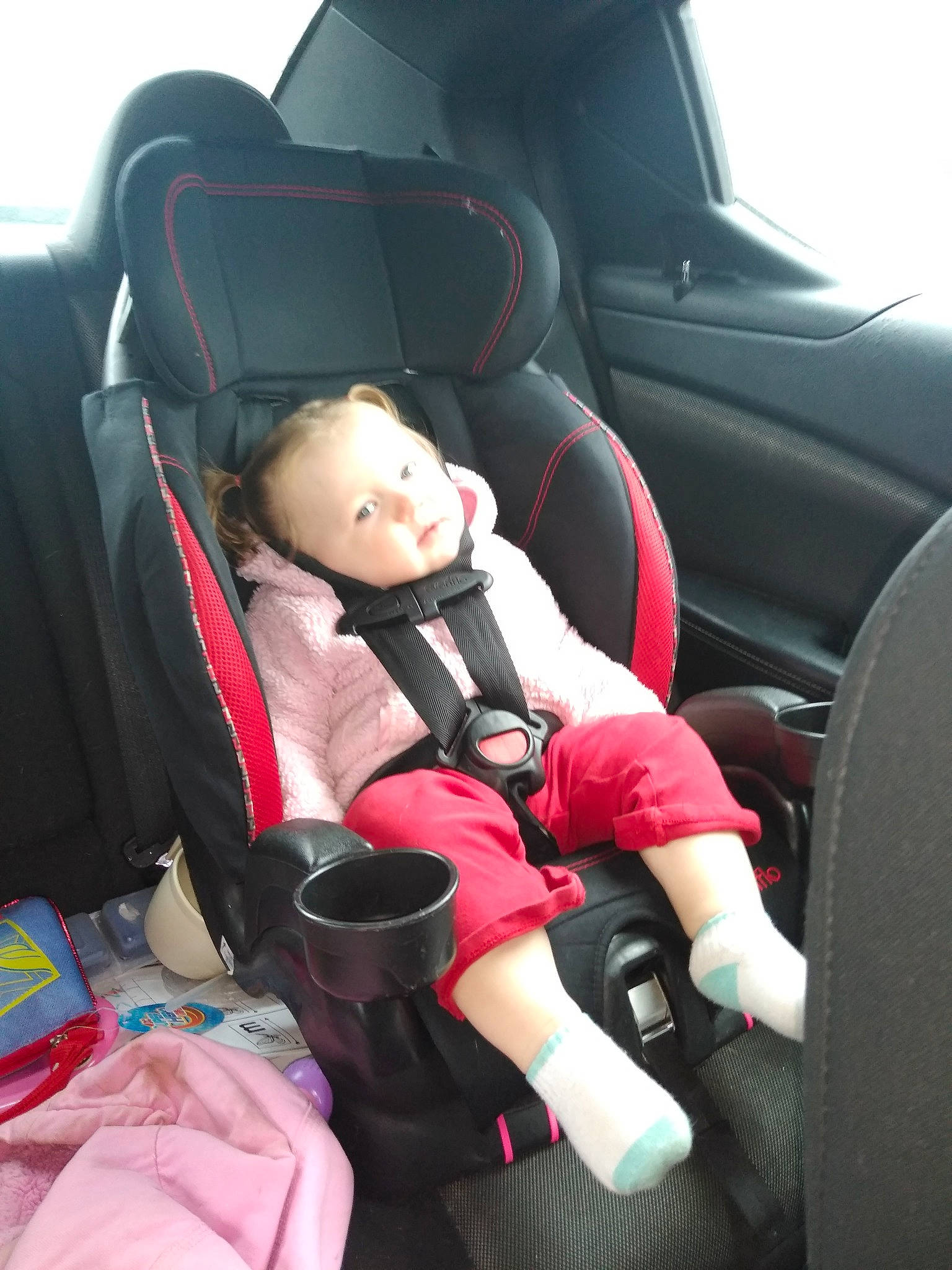Emma joined the competition — help win amazing prizes! auto_part, baby_in_car_seat, car, car_seat, car_seat_cover, child, family_car, head_restraint, person, seat_belt, toddler, vehicle