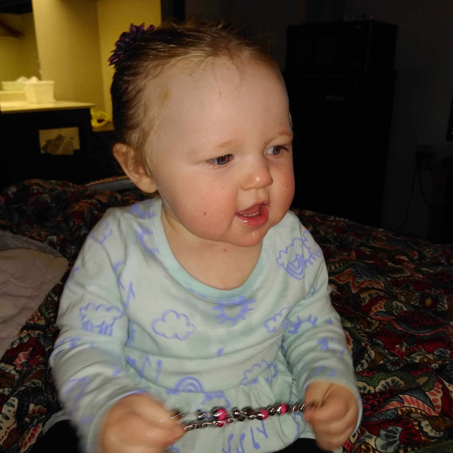 Emma is registered to the contest to win money with this photo: baby, cheek, child, eye, face, head, iris, person, sitting, skin, smile, toddler