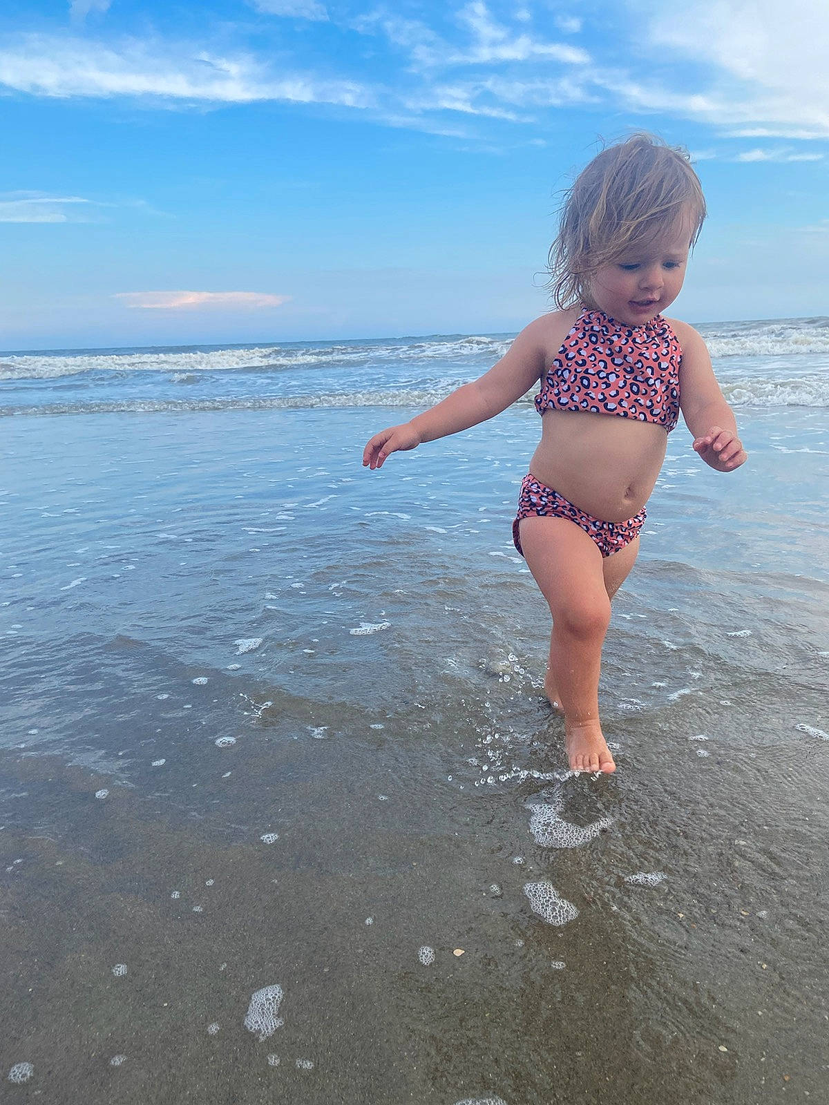 Nicole is registered to the contest to win money with this photo: barefoot, beach, child, coast, coastal_and_oceanic_landforms, fun, leg, ocean, person, photography, play, sand, sea, shore, sky, summer, toddler, vacation, water, wave