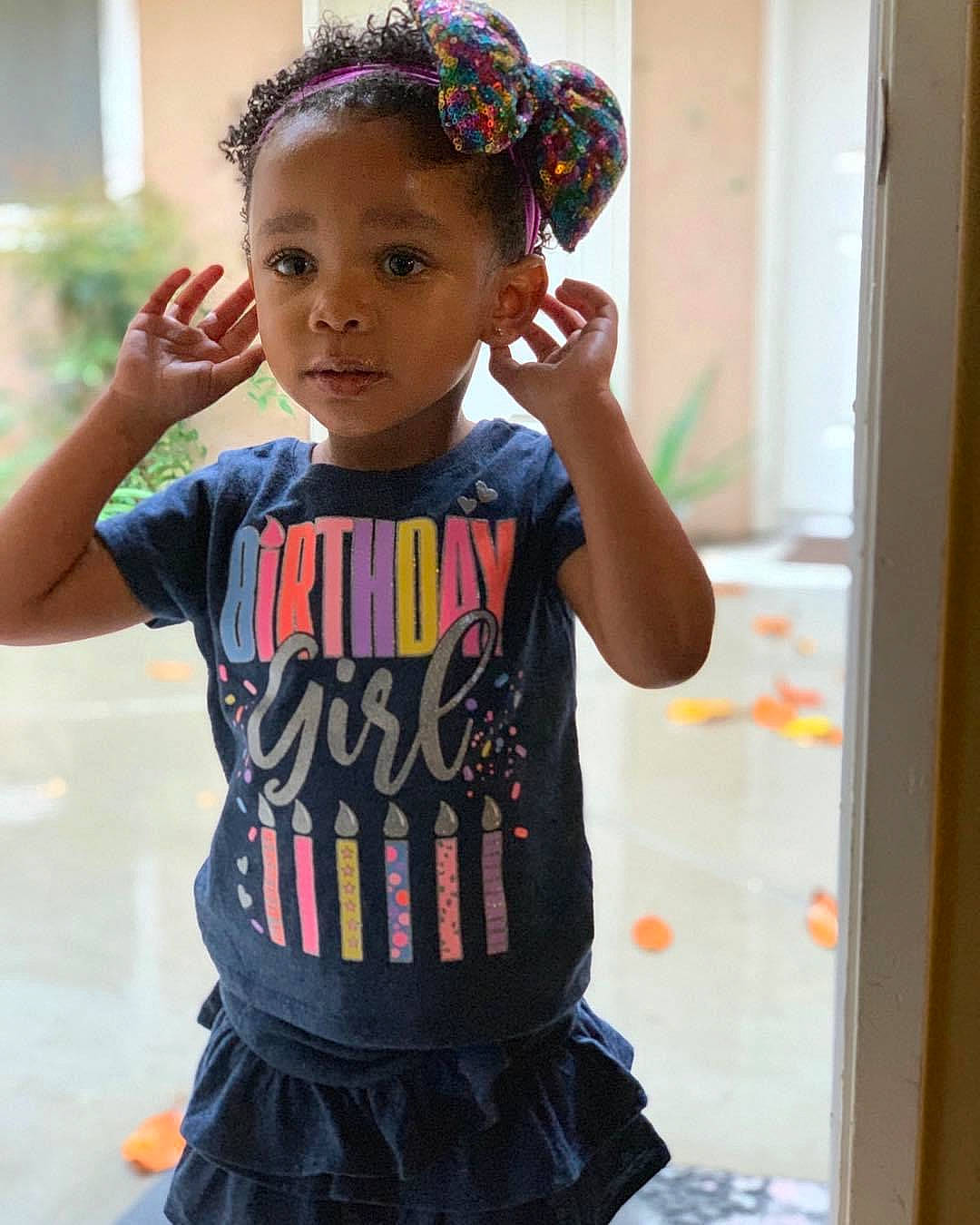 Jadenna is registered to the contest to win money with this photo: baby_toddler_clothing, child, costume, fashion_accessory, fashion_design, fun, gesture, hair_tie, happy, headband, headpiece, jewellery, magenta, neck, necklace, pattern, person, sleeve, t_shirt, toddler
