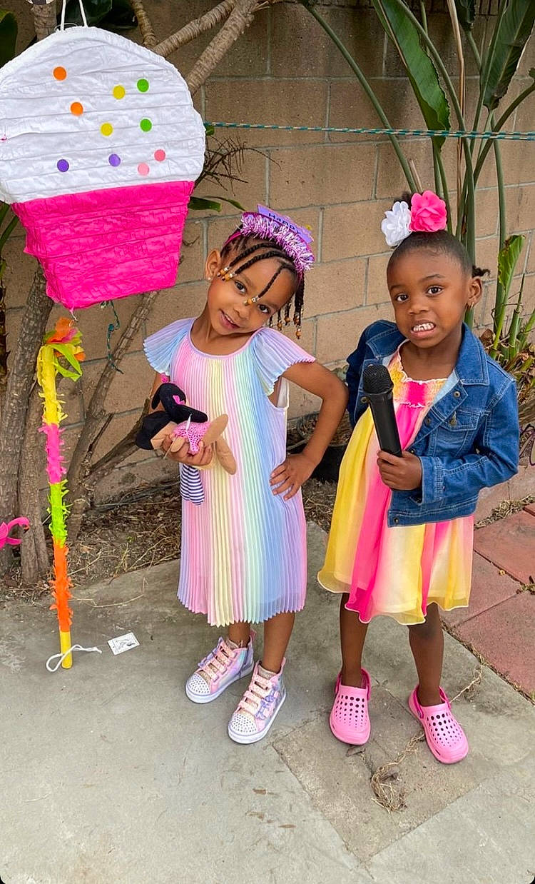 Jadenna joined the competition — help win amazing prizes! adaptation, art, child, clothing, event, footwear, fun, green, happy, hat, headwear, leisure, magenta, person, pink, plant, purple, sandal, shoe, smile