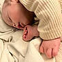 baby, sleeping, blanket, foot, hand, cozy, soft, infant, closeup, skin, ribbed_clothing, peaceful, newborn, wrinkled_skin, rest, cute, tiny_toes, fabric, portrait, comfort