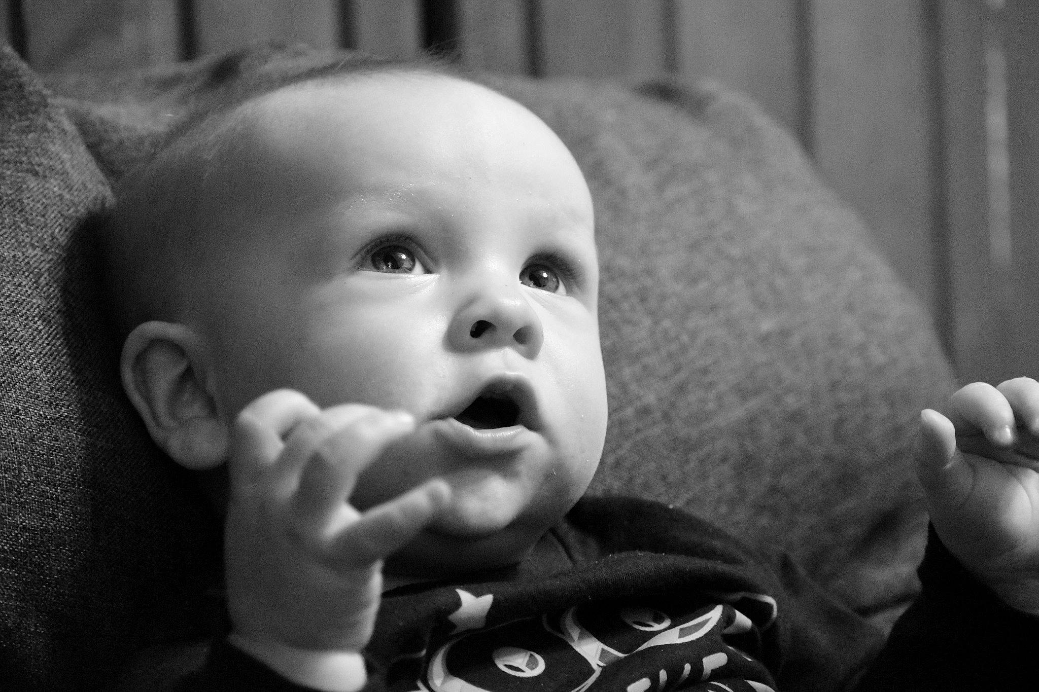 Barry is registered to the contest to win money with this photo: baby, black, black_and_white, cheek, child, eye, face, finger, hand, head, monochrome, monochrome_photography, mouth, nose, person, photography, skin, smile, style, toddler