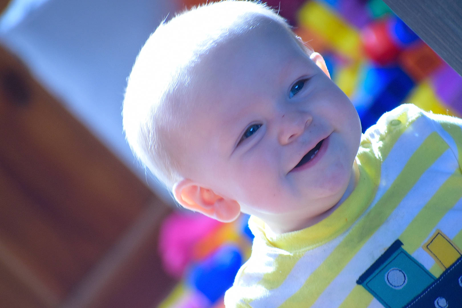 Barry is registered to the contest to win money with this photo: baby, cheek, child, close_up, ear, eye, face, facial_expression, fun, happy, head, nose, person, photography, play, skin, smile, toddler