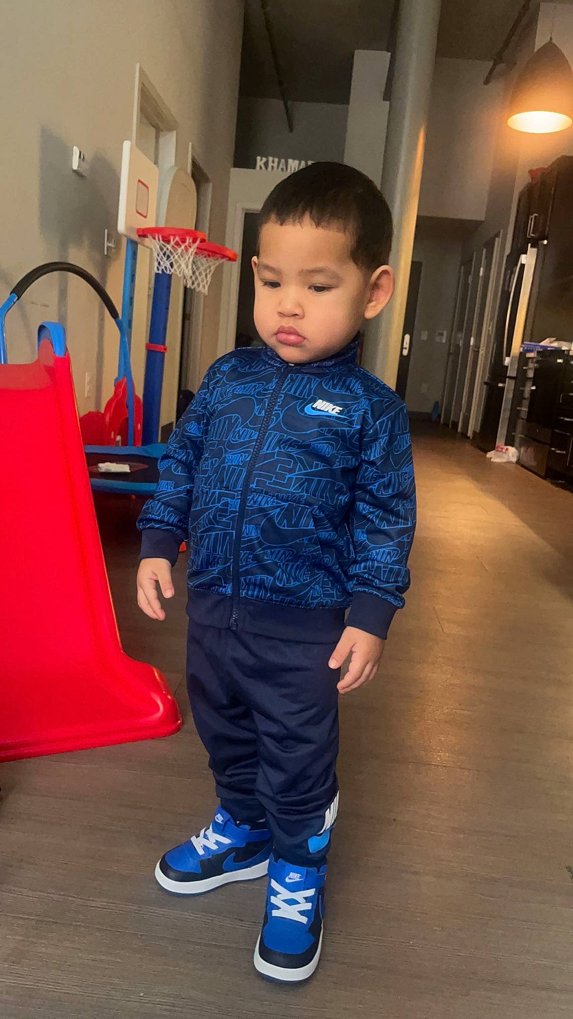 Khamari joined the competition — help win amazing prizes! child, denim, electric_blue, fashion_design, floor, flooring, formal_wear, fun, hardwood, joint, leisure, person, shoe, shoulder, sleeve, sneakers, sportswear, standing, sweatpant, t_shirt