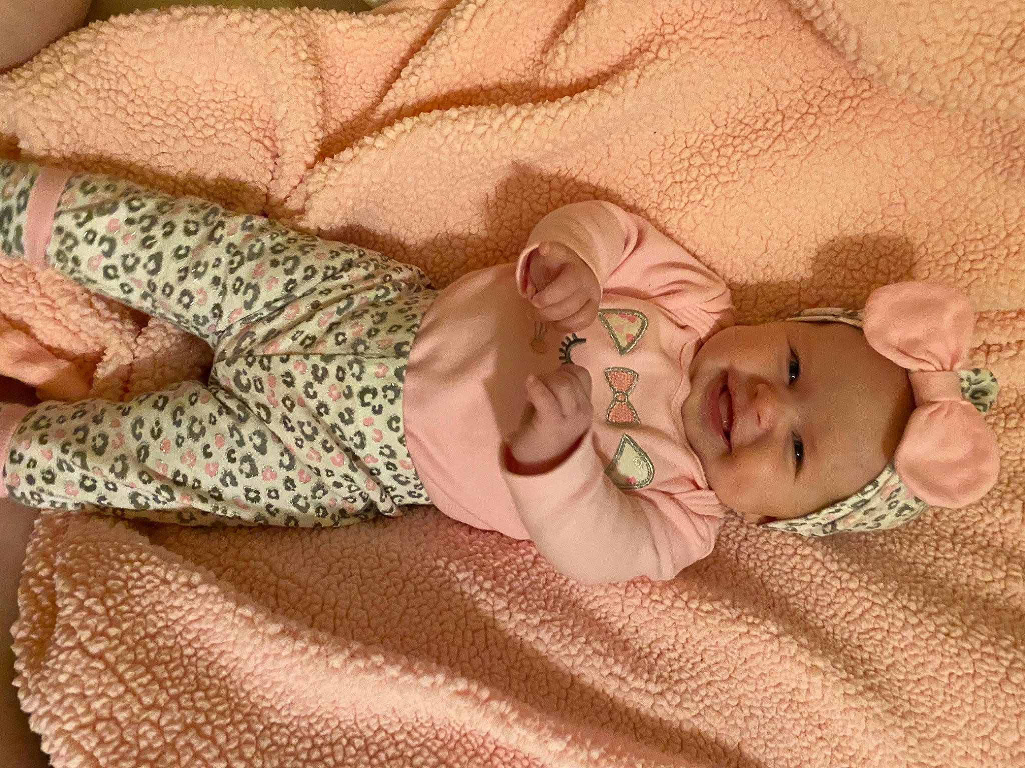 Harper joined the competition — help win amazing prizes! baby, baby_sleeping, baby_toddler_clothing, child, comfort, fawn, finger, glasses, hand, headwear, human_body, joy, linens, nail, pattern, peach, person, pink, skin, sleeve