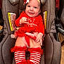 baby, infant, car_seat, red_clothing, striped_socks, headband, smiling, tutu, holiday, christmas, festive, cute, happy, child, indoors, fabric, accessory, person, seat, wearing